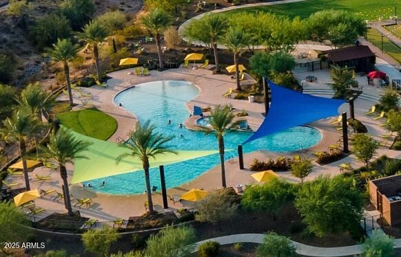 view of pool with a water play area