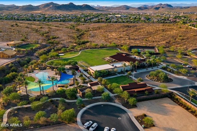 birds eye view of property featuring a mountain view