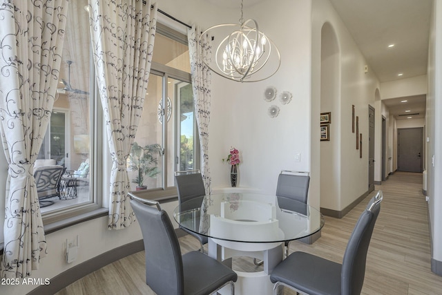 4915 N Greentree Dr, Litchfield Park, AZ 85340 - dining room featuring a chandelier and light wood-type flooring