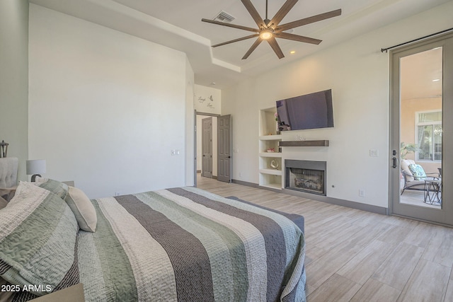 4915 N Greentree Dr, Litchfield Park, AZ 85340 - bedroom featuring a high ceiling, ceiling fan, and light wood-type flooring