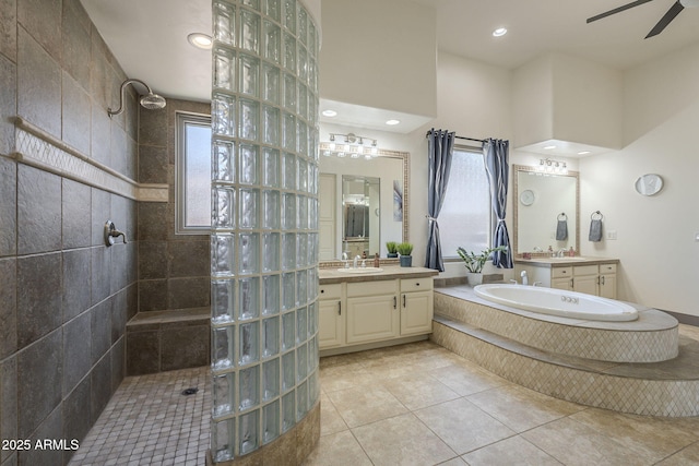 4915 N Greentree Dr, Litchfield Park, AZ 85340 - bathroom featuring independent shower and bath, vanity, a healthy amount of sunlight, and tile patterned flooring