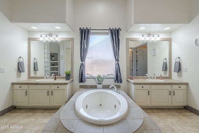 4915 N Greentree Dr, Litchfield Park, AZ 85340 - bathroom with vanity and tiled bath