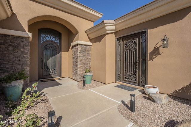 4915 N Greentree Dr, Litchfield Park, AZ 85340 - view of exterior entry with a patio