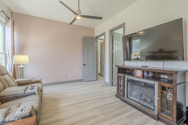 4915 N Greentree Dr, Litchfield Park, AZ 85340 - living room featuring light hardwood / wood-style floors and ceiling fan
