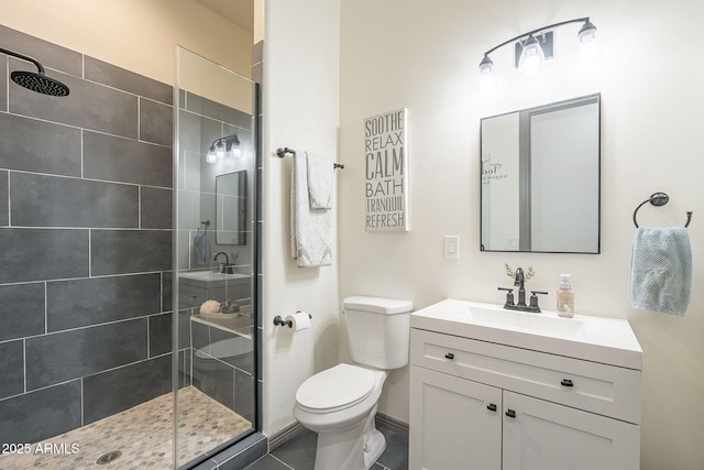 4915 N Greentree Dr, Litchfield Park, AZ 85340 - bathroom with tiled shower, vanity, and toilet