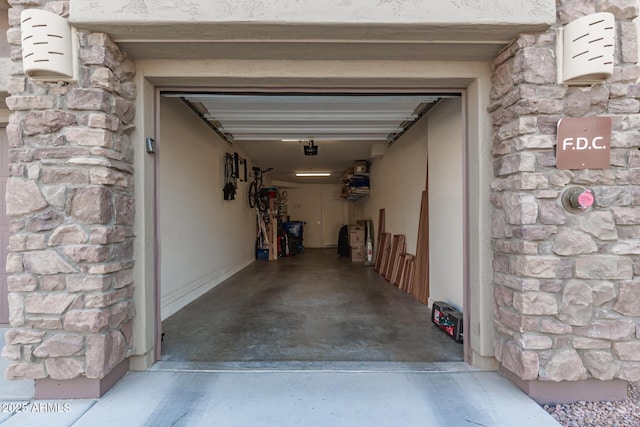 garage featuring a garage door opener