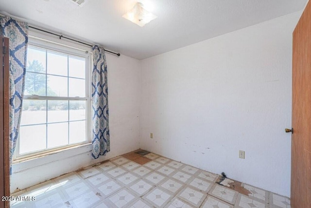 1055 S 4th St, Coolidge, AZ 85128 - empty room with light floors and plenty of natural light