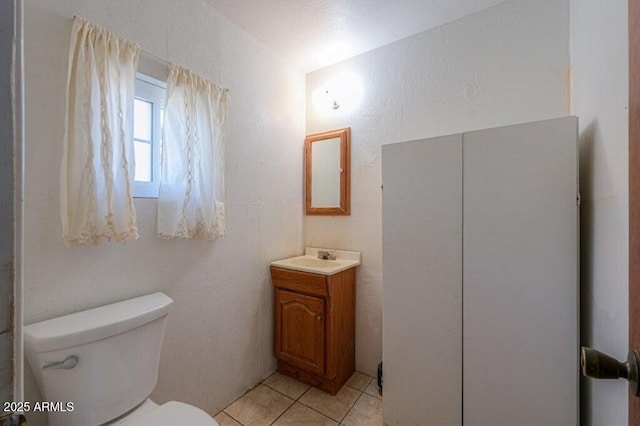 1055 S 4th St, Coolidge, AZ 85128 - bathroom with vanity, tile patterned flooring, and toilet