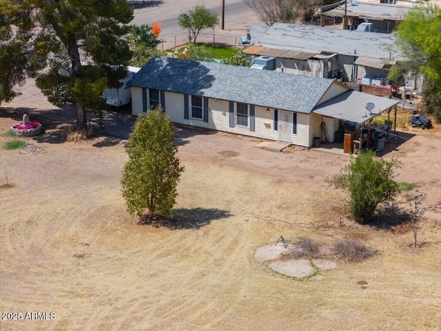 1055 S 4th St, Coolidge, AZ 85128 - exterior space featuring driveway and a shingled roof