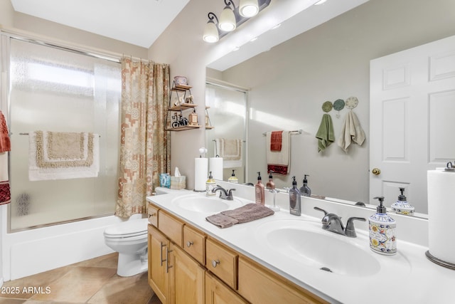 full bathroom with vanity, tile patterned floors, toilet, and shower / bath combo with shower curtain