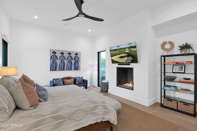 bedroom featuring ceiling fan and light wood-type flooring