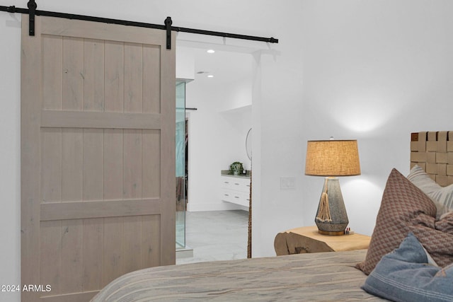 bedroom with a barn door