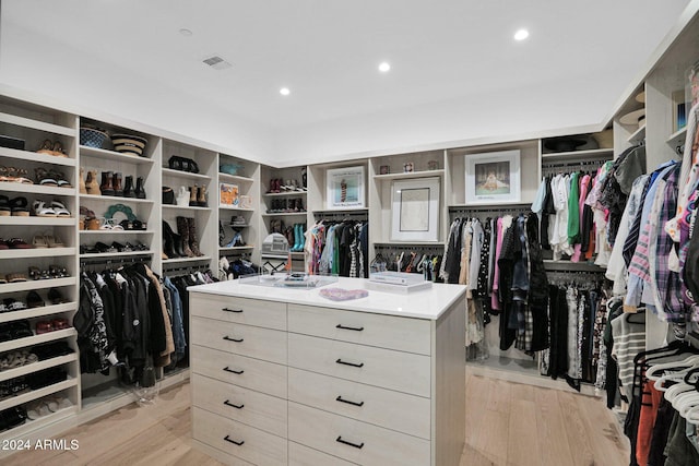 walk in closet featuring light wood-type flooring