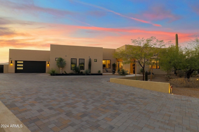 adobe home with a garage