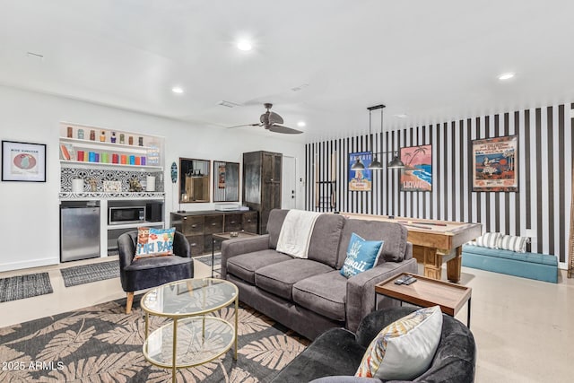 living room with ceiling fan