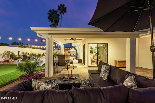 view of patio / terrace with an outdoor living space and ceiling fan