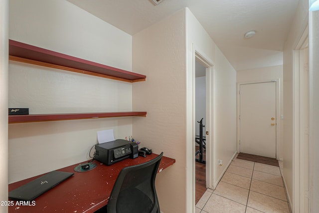 office with light tile patterned floors