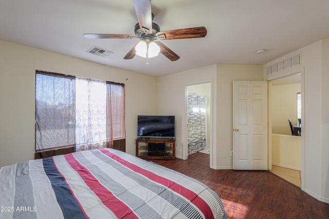 bedroom with ceiling fan and dark hardwood / wood-style flooring