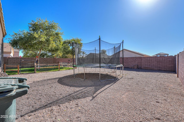 view of yard featuring a trampoline