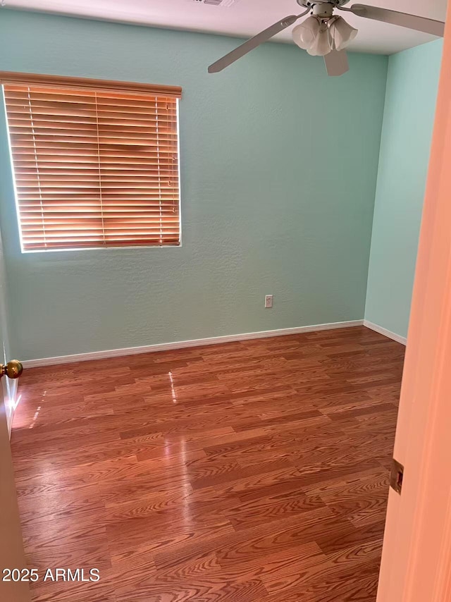 8507 W Pioneer St, Tolleson, AZ 85353 - unfurnished room with ceiling fan and wood finished floors