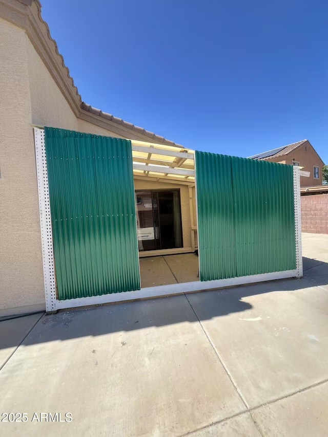 8507 W Pioneer St, Tolleson, AZ 85353 - view of home's exterior featuring stucco siding