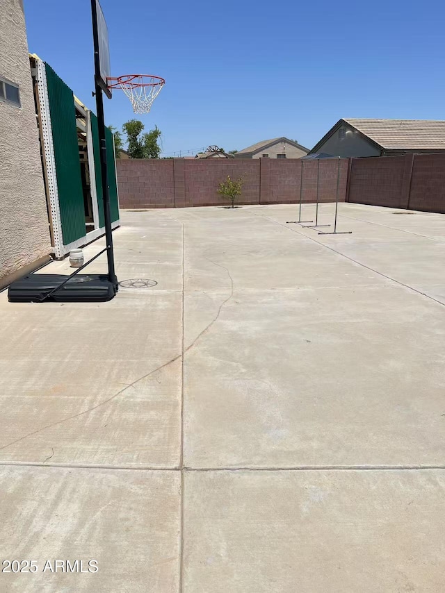 8507 W Pioneer St, Tolleson, AZ 85353 - fenced backyard featuring basketball hoop
