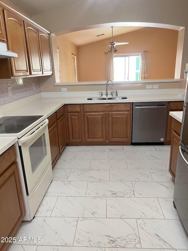 8507 W Pioneer St, Tolleson, AZ 85353 - kitchen with stainless steel dishwasher, white range with electric stovetop, light marble finish floors, ceiling fan, and light countertops