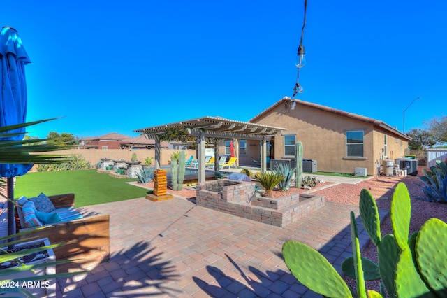 view of patio featuring a pergola and an outdoor living space