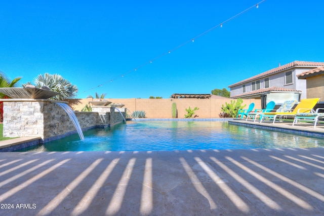 view of pool featuring pool water feature