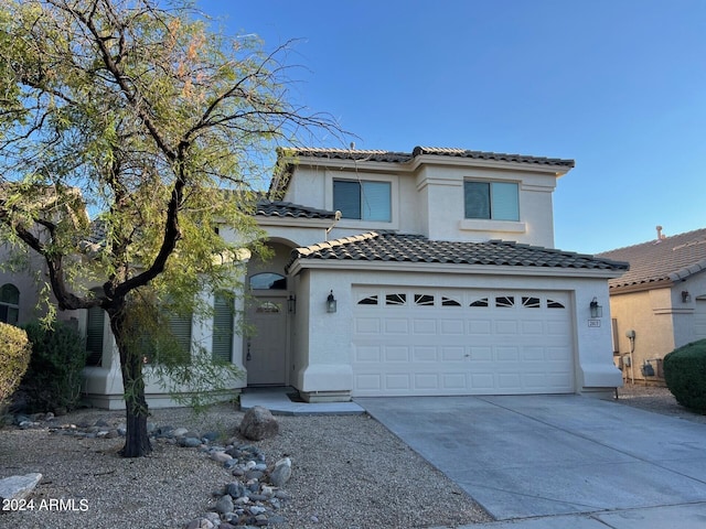 view of front of property featuring a garage