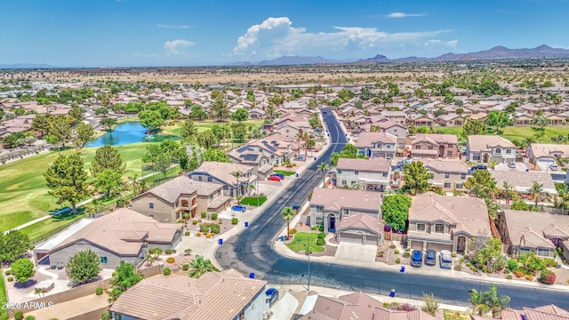 bird's eye view featuring a residential view and a water and mountain view