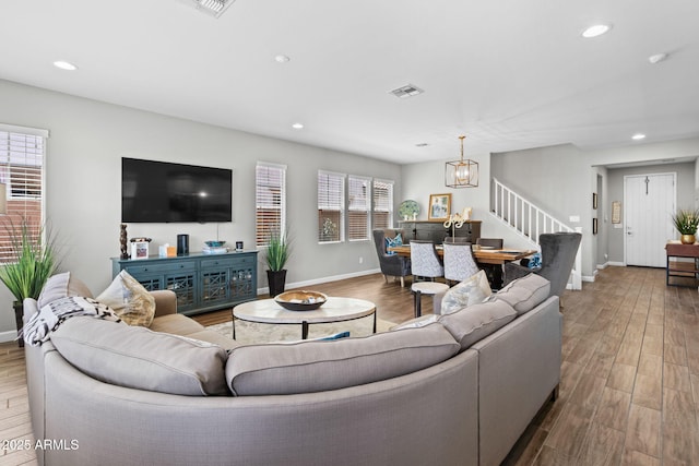 974 W Zion Way, Chandler, AZ 85248 - living room with stairway, a chandelier, wood finished floors, and recessed lighting