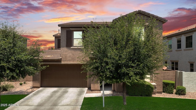 974 W Zion Way, Chandler, AZ 85248 - view of front of home featuring an attached garage, stucco siding, and driveway