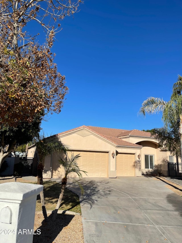 view of front of property featuring a garage