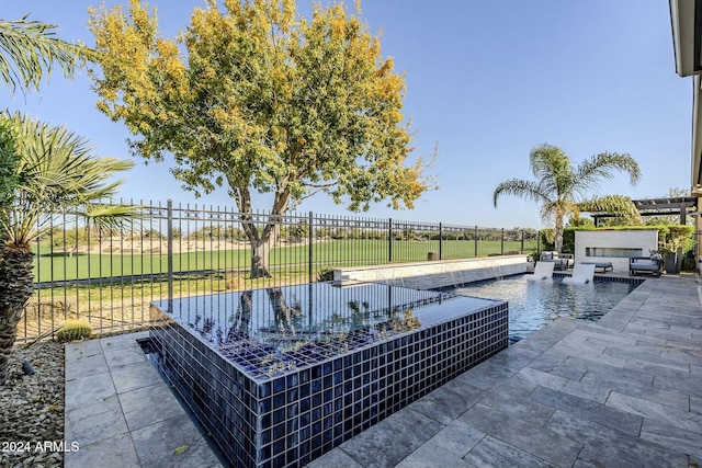 view of patio featuring exterior kitchen