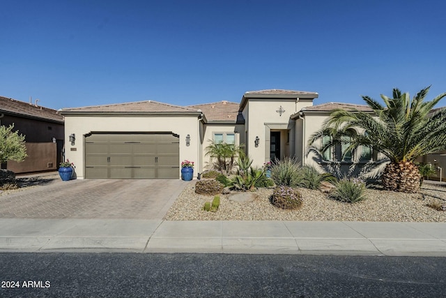 view of front of home with a garage