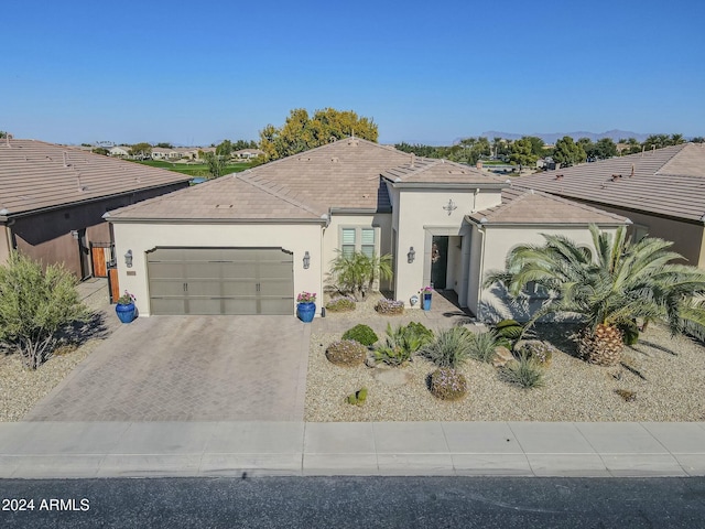 single story home featuring a garage