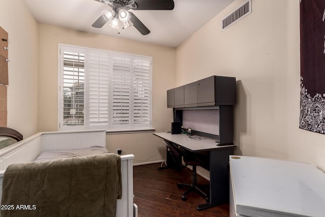 home office featuring ceiling fan and dark hardwood / wood-style floors