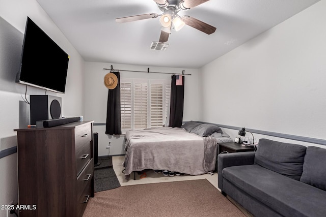 carpeted bedroom with ceiling fan