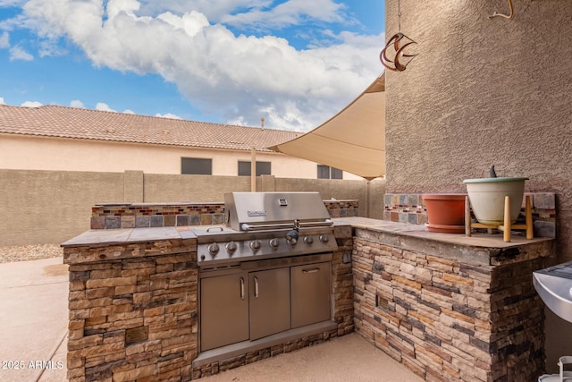 view of patio / terrace featuring a grill and area for grilling