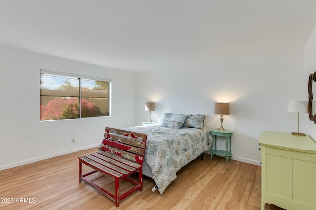 bedroom with light hardwood / wood-style flooring