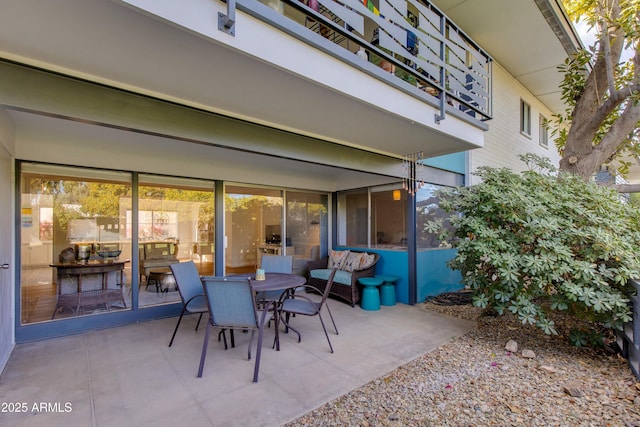 view of patio with a balcony