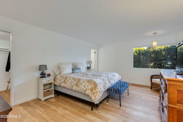 bedroom featuring light wood-type flooring