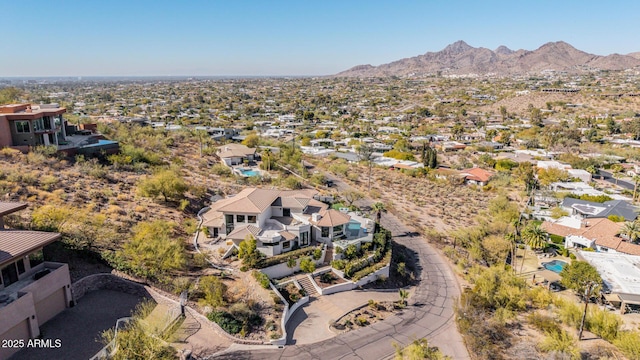 drone / aerial view featuring a mountain view