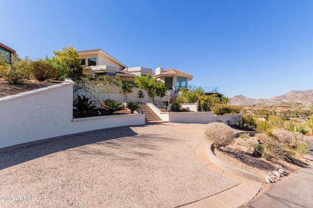 exterior space featuring a mountain view