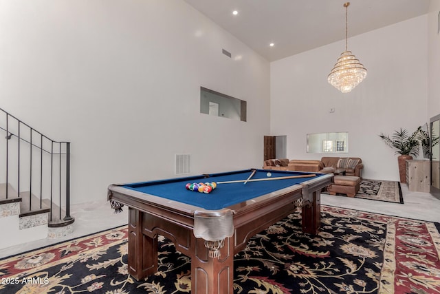 rec room featuring a high ceiling and billiards