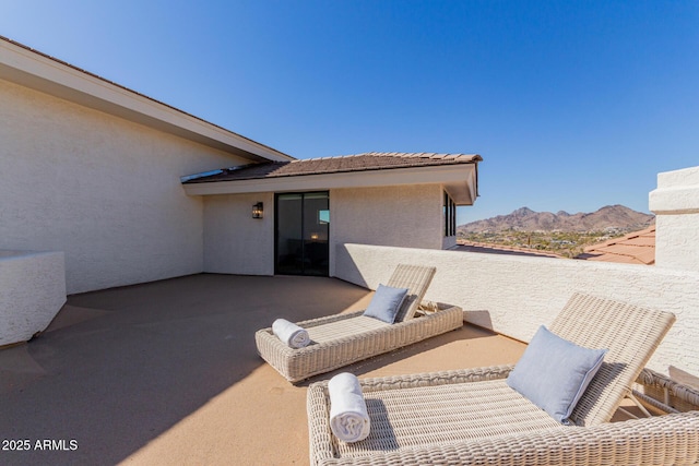 view of patio featuring a mountain view