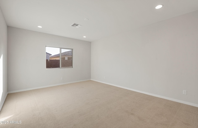 view of carpeted spare room