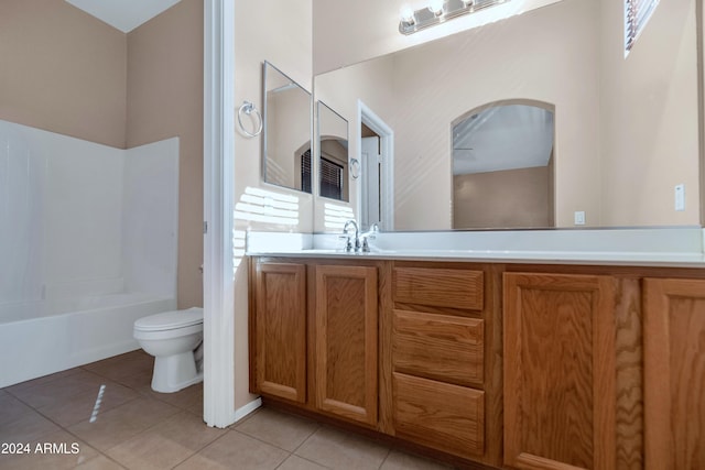17365 N Cave Creek Rd Unit 116, Phoenix, AZ 85032 - bathroom featuring toilet, tile patterned flooring, vanity, and bathing tub / shower combination
