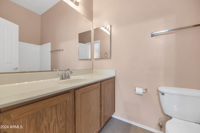 17365 N Cave Creek Rd Unit 116, Phoenix, AZ 85032 - bathroom featuring toilet, vanity, tile patterned flooring, and baseboards